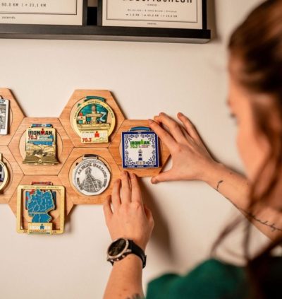 Showcase your achievements with a Work-Out medal display board.